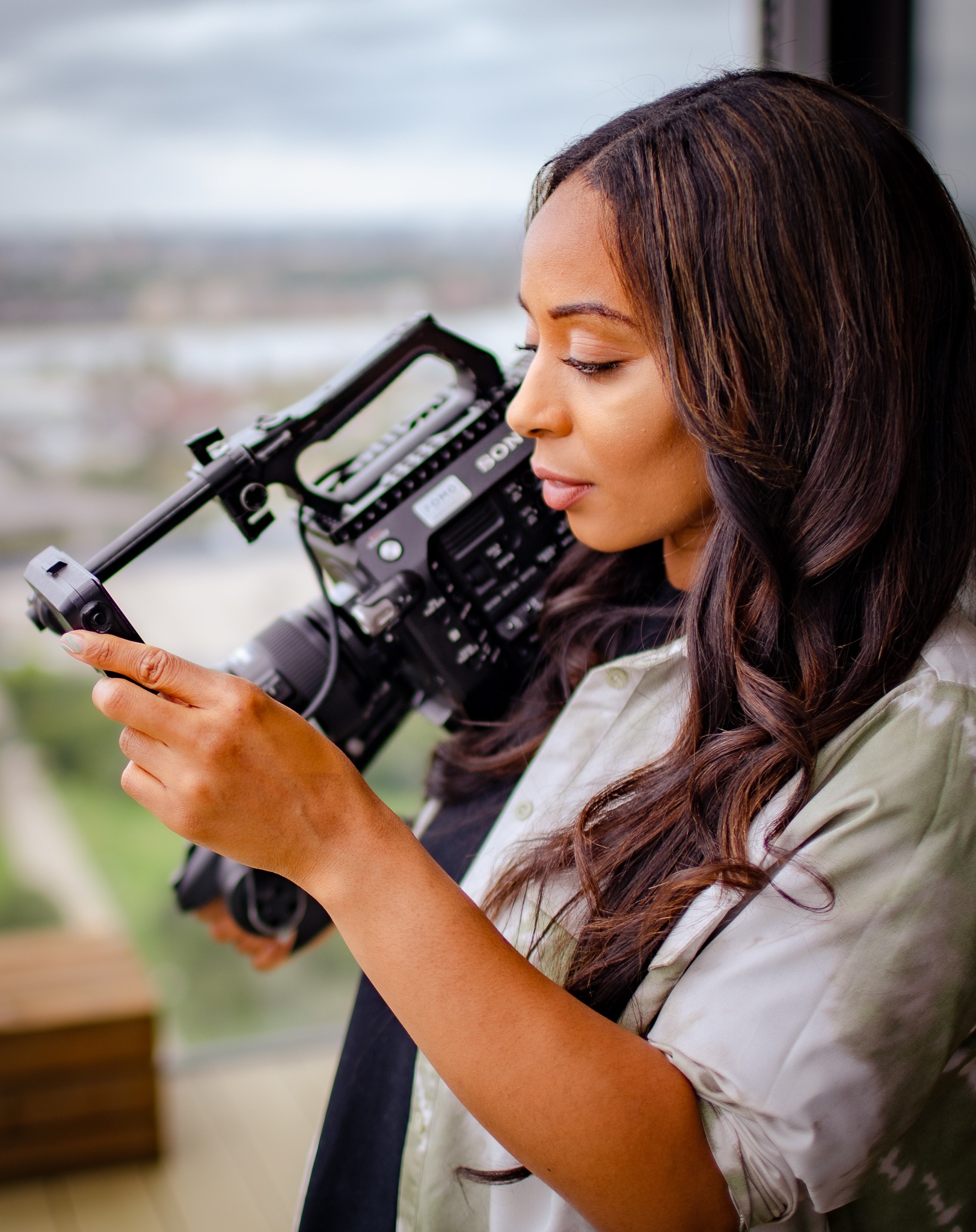 April Walker operating a camera